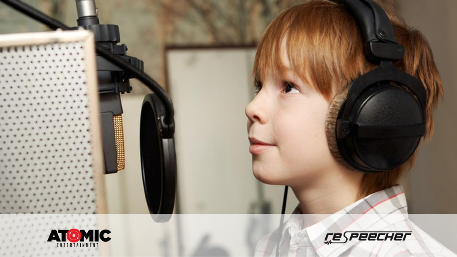 Young boy recording in a studio, wearing professional headphones and speaking into a high-quality studio microphone. The environment suggests a professional audio recording setup, aimed at producing clear and high-fidelity sound, ideal for voice cloning and educational audio projects